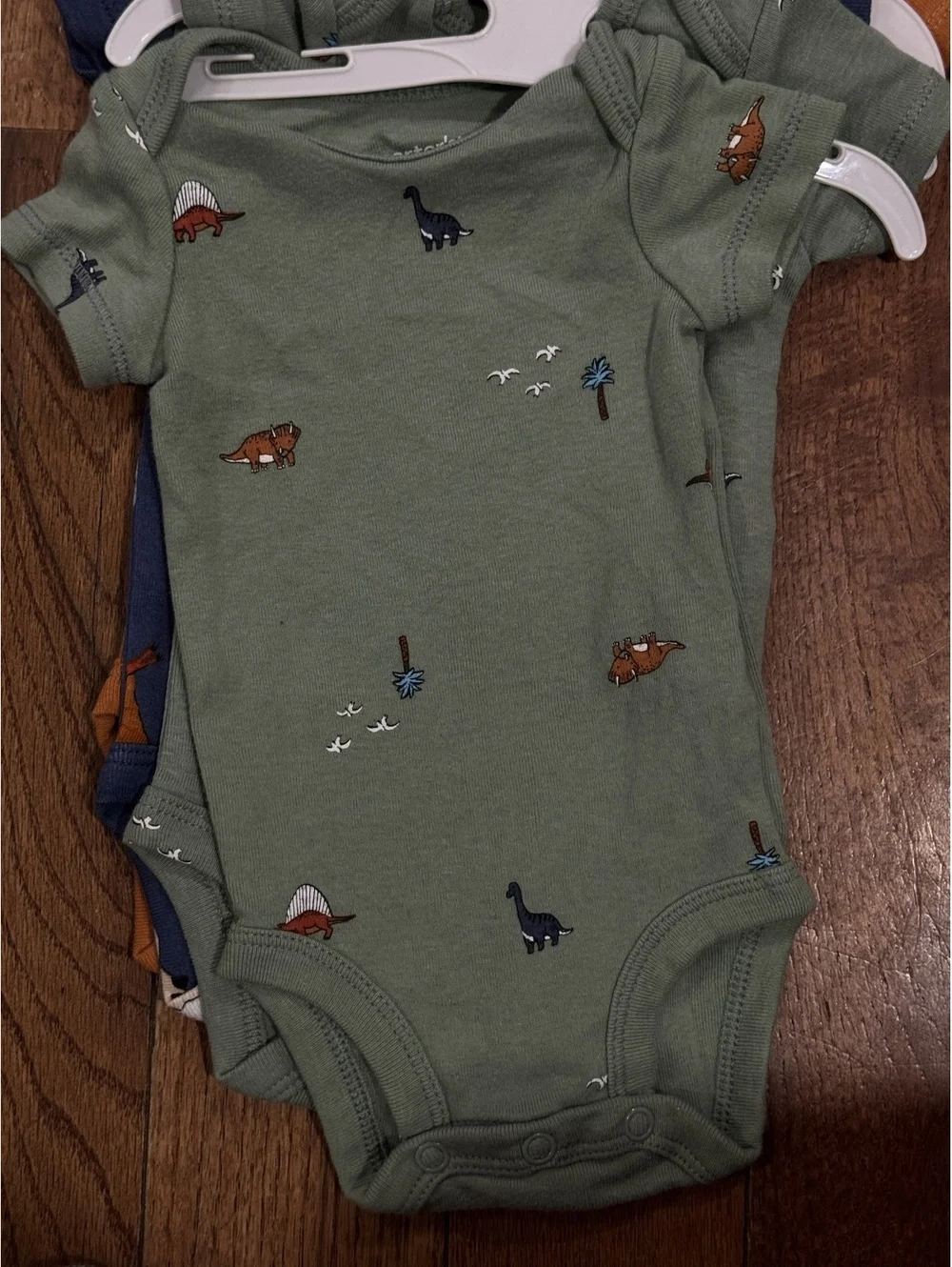 Carter's Newborn Baby Bodysuit Set with Dinosaur Prints, 3-Pack